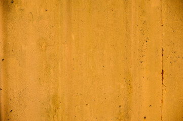 background metal surface with orange paint and rust
