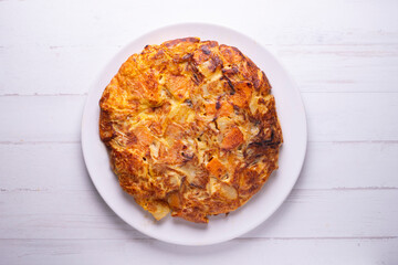 Spanish omelette with cheese, potatoes and sweet potato