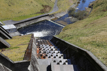 An aerial view of the spillway or overflow at Nant-y-moch Reservoir, used for hydro-electricity,  in Ceredigion, Wales, UK.
