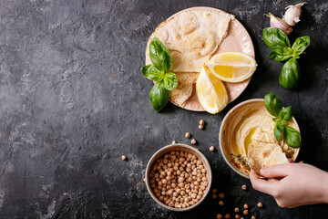Hummus with olive oil and ground cumin