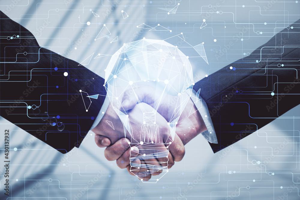 Poster double exposure of light bulb hologram and handshake of two men. idea concept.