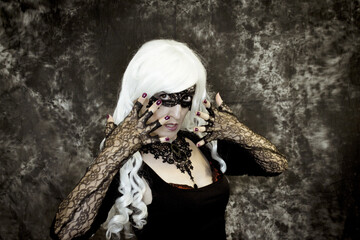Woman in gothic style costume for halloween party