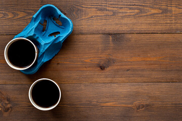 Top view of black coffee in paper cups