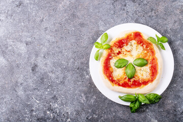 Homemade pizza margherita with mozzerala cheese