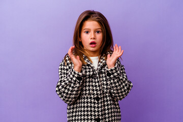 Little caucasian girl isolated on purple background Little caucasian girl isolated on purple...
