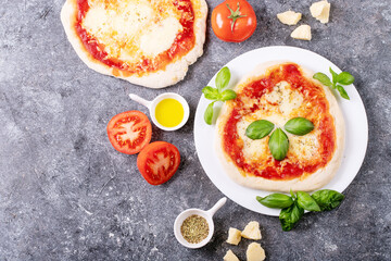 Homemade pizza margherita with mozzerala cheese