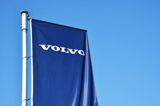 Hamburg, Germany - March 31, 2021: Flag with tho logo of Volvo - The Volvo Group is a Swedish multinational manufacturing company