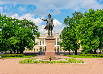 Monument to Russian poet Alexander Pushkin on Culture square and Russian museum at background, Saint Petersburg, Russia