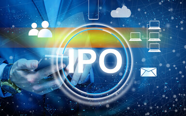 Businessman hand touching IPO Initial Public Offering sign on virtual screen