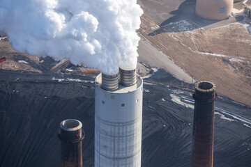aerial view of power plant smoke stacks.