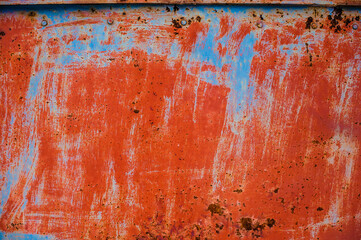 background metal surface with rust and blue-red color