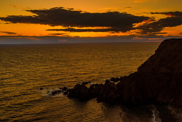 Sunset over Bay of Fundy and Rocky Cliffs