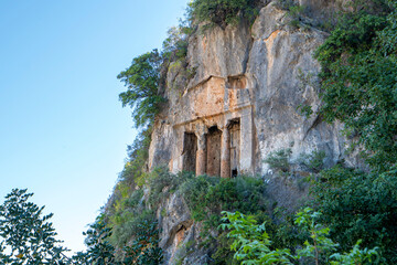 The scenic view of The Tomb of Amyntas, also known as the Fethiye Tomb, is an ancient Greek rock-hewn tomb at ancient Telmessos, in Lycia, currently in the district of Fethiye in Muğla.
