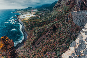 Mountain and sea landscape on an island with clouds