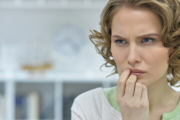 Fototapeta premium portrait of beautiful young sad woman