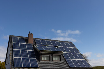 solar panels on the roof of a single family house