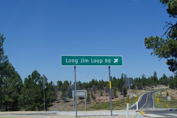 Directional sign on the road with directions to the Long Jim Loop Road at the Grand Canyon National Park, south rim, Arizona.