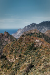 Fototapeta na wymiar Landscape of a volcanic island with mountains