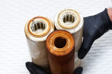 Three replaceable used water filters. Replaceable dirty filters for filtration of reverse osmosis...