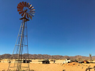 A windmill in Namib Desert close to the road stop at Solitaire in Namibia