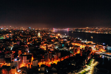 Istanbul, Turkey, night city lights, drone flight. Beautiful panorama view.