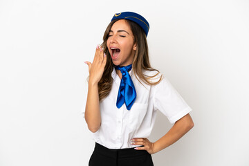Airplane stewardess over isolated white background yawning and covering wide open mouth with hand