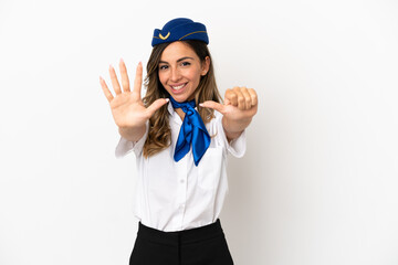 Airplane stewardess over isolated white background counting six with fingers