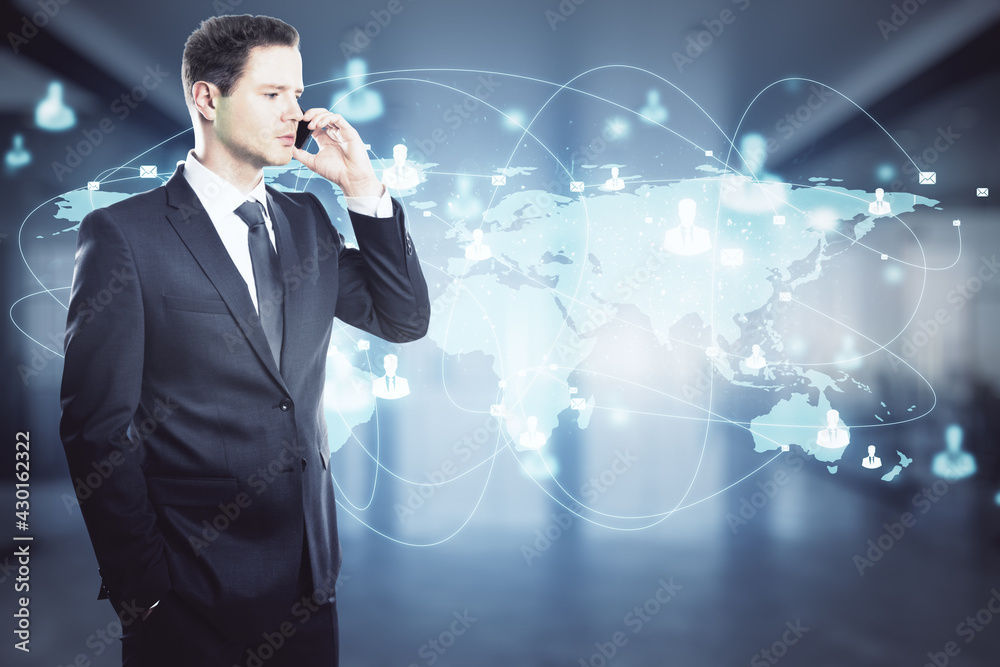 Poster Businessman in a suit talking on the phone with a world map with rays in the background. International and worldwide trade concept
