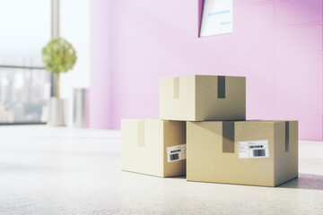 Delivery and courier service concept with cardboxes with barcodes on concrete floor in empty sunny room with pink wall
