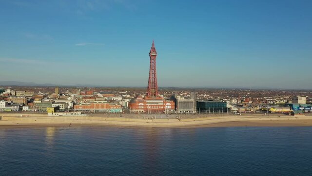 4K: Aerial Drone Video of The Blackpool Tower, England, UK. Flying upwards with the landmark straight ahead. Stock Video Clip Footage