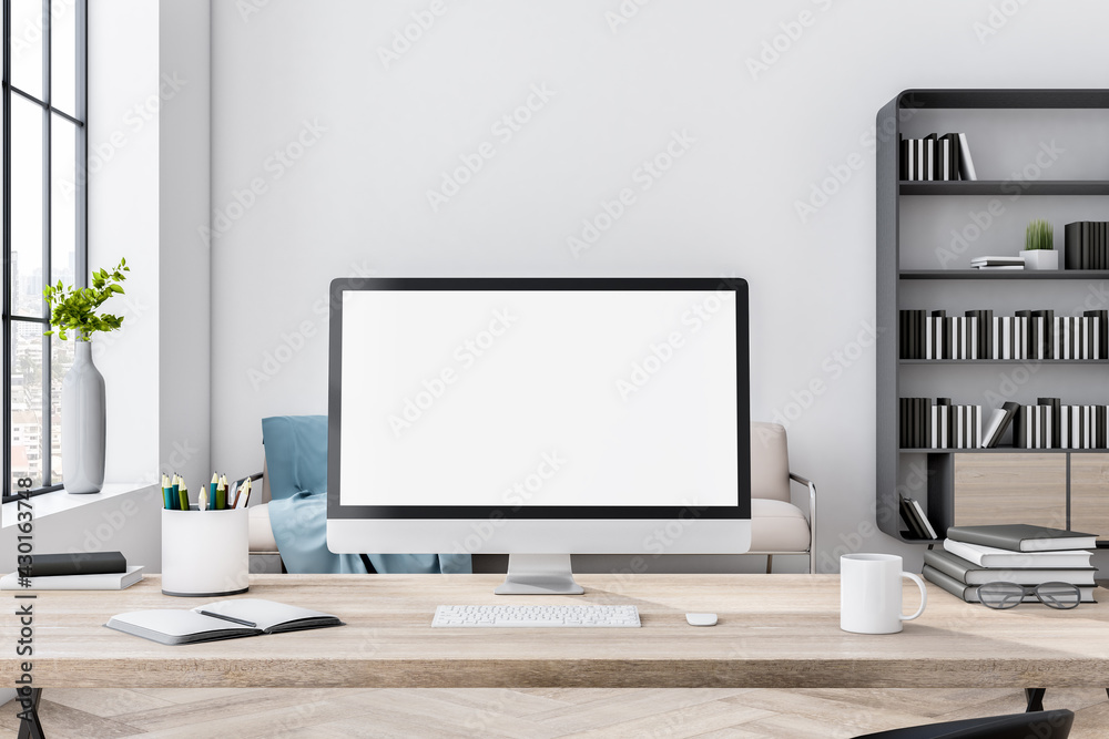 Aufkleber blank white computer monitor on light wooden table on stylish home workspace with white wall and big