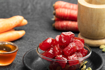 Ayurvedic Gajar Ka Murabba Or Gazar Murba Is Carrot Jam Made Of Carrots, Sugar Syrup And Bee Honey Shahad Madhu. It Can Be Preserved And Stored. Isolated On Black Background With Copy Space