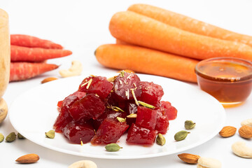 Ayurvedic Gajar Ka Murabba Or Gazar Murba Is Carrot Jam Made Of Carrots, Sugar Syrup And Bee Honey Shahad Madhu. It Can Be Preserved And Stored. Isolated On White Background