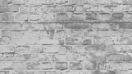 Abstract old white brick wall. background facade brick wall black and white. Vintage old brick wall texture. Grunge stone wall horizontal background. Dilapidated building facade with damaged plaster.
