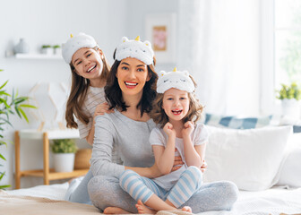 girls and their mother enjoying sunny morning