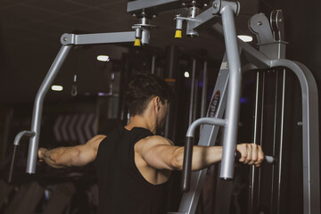 Fototapeta premium young athlete training in a gym