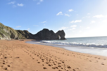 Durdle Door sandy beach in the morning, UK