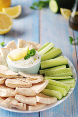 Tzatziki, Greek dip sauce with pita and cucumbers