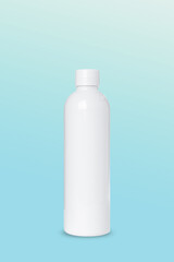 empty white plastic bottle for cosmetics on blue background. Mockup