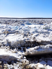 Large white pieces of cracked ice. Spring ice melting and ice drift on the river. Global warming. High quality photo © Андрей Кальсин