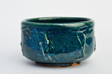 Green and blue pottery cup