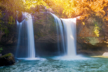 Fototapeta na wymiar Beautiful waterfall with sunlight in jungle, Haew Suwat Waterfall at khao yai Nakhonratchasima province