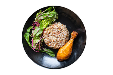 buckwheat porridge with chicken leg leaves green petals lettuce mix fresh healthy appetizer trend diet meal snack copy space food background rustic. top view keto or paleo diet