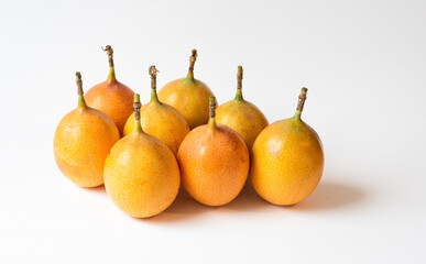 Granadilla or yellow passion fruit isolated on white background. Grenadia Passion fruit Cut in Half Exotic Fruits