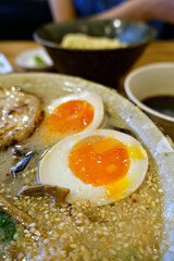 Close-up image of Japanese Pork Tonkotsu Ramen with  Eggs and Char Siu.
