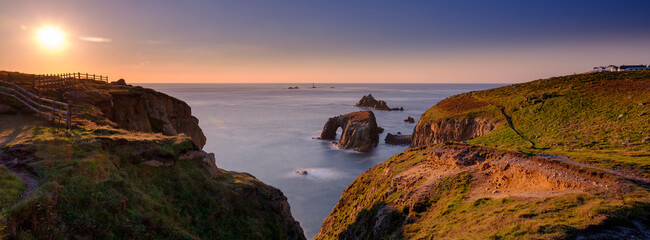 Sunset over Land's End, Longships and the islands of the Armed Knight and Enys Dodnan, Cornwall, UK