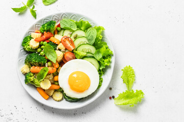 Healthy egg vegetables bowl. Top view, space for text.