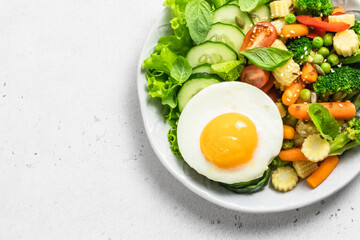 Healthy egg vegetables bowl. Top view, space for text.
