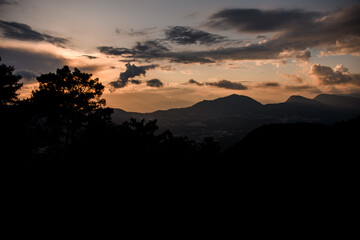 Great mountain landscape with colorful vivid sunset on the cloudy sky, nature outdoor travel background.