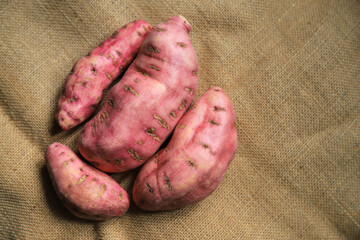 Sweet potato on sack for being cooking ingredient for make food or dessert